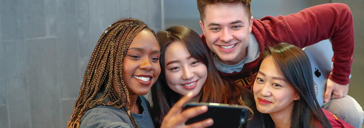 A group of students taking a selfie.